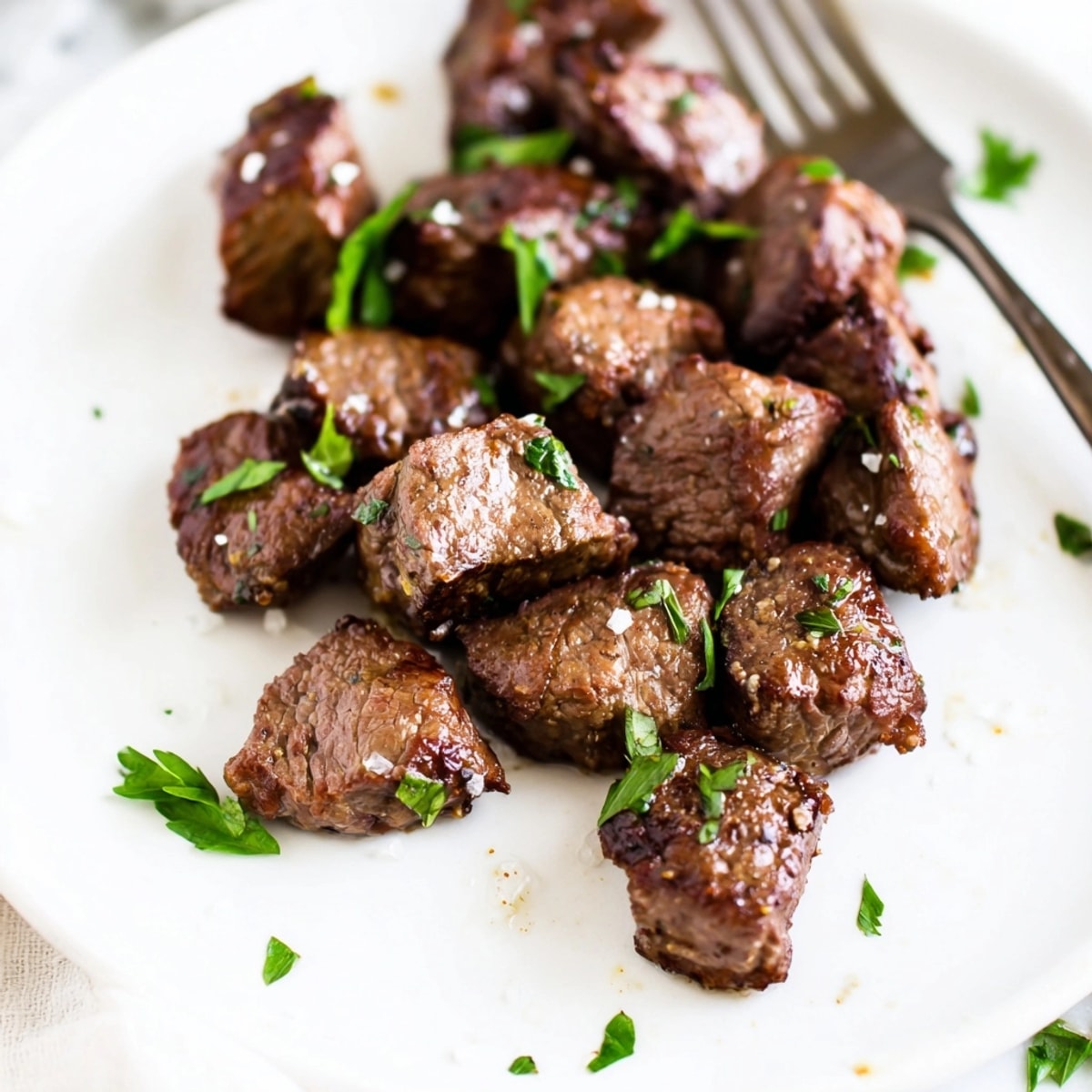 Perfectly cooked air fryer steak bites showcasing a quick, crowd-pleasing main course.