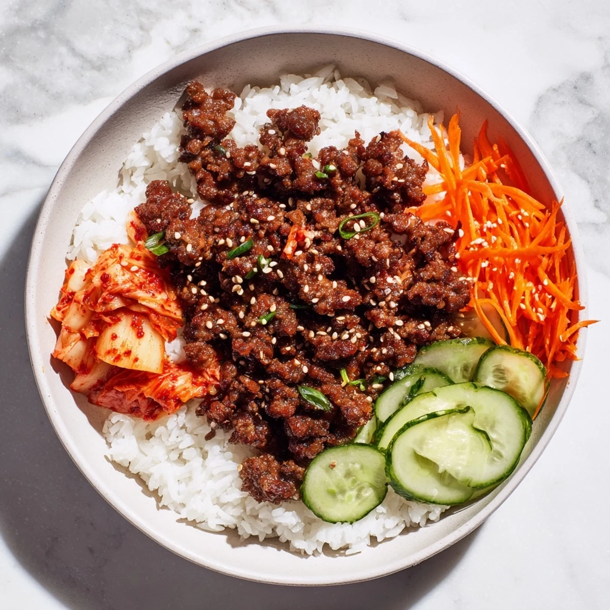A close-up of a delightful Spicy Korean Beef Bowl showcasing tender beef and vibrant, colorful vegetables.