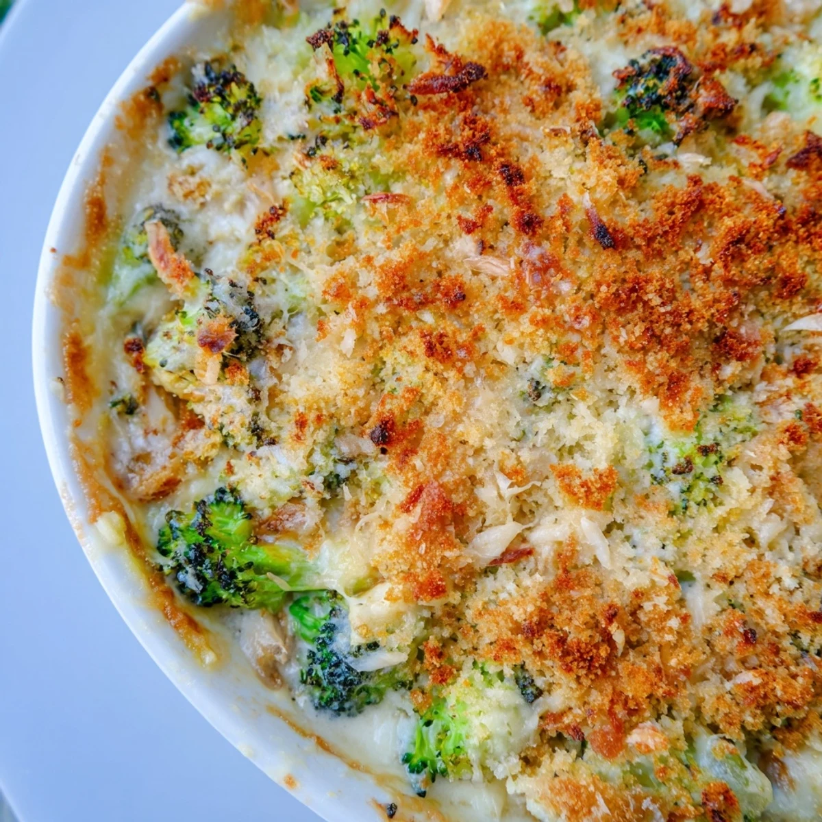 A close-up view of the delicious Cheesy Cauliflower and Broccoli Gratin, fresh from the oven, bubbling hot.