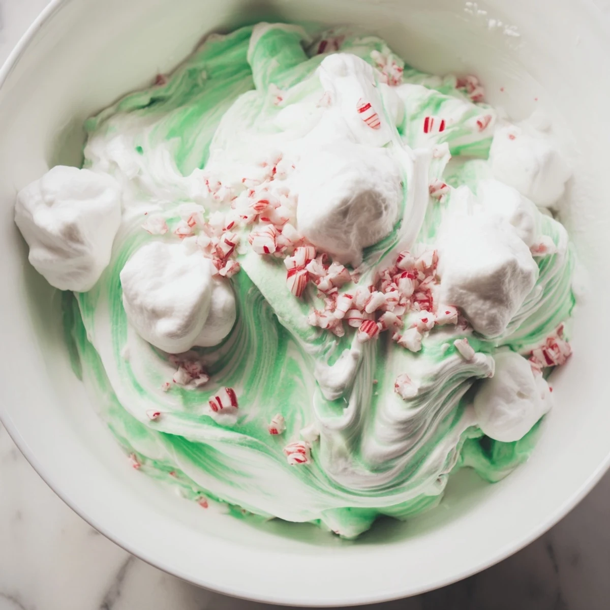 Creamy, swirled Twist Peppermint dessert, a cool and refreshing treat with peppermint extract and vanilla.