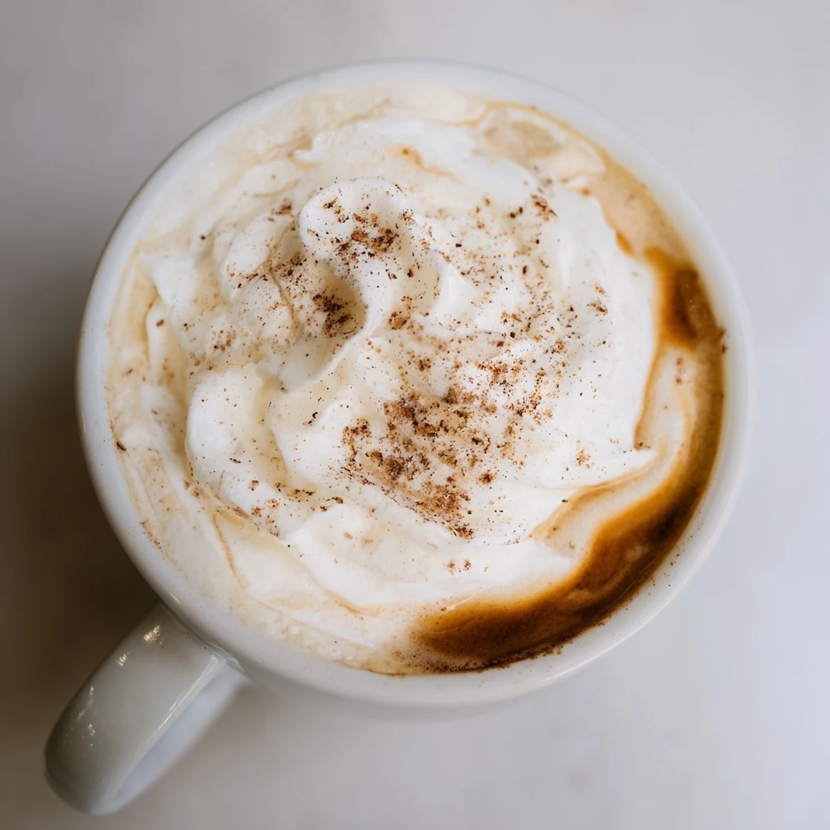 A close-up shot of a flavorful Latte Spiced, perfect warm-toned beverage for cold weather.
