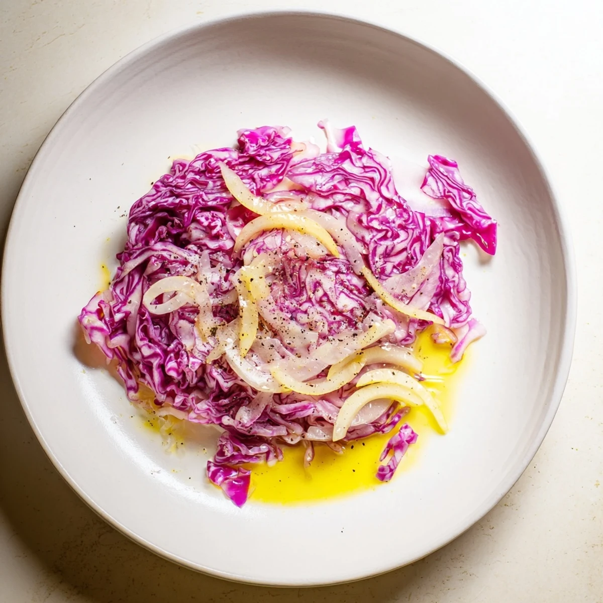 Tender, ruby-red Braised Red Cabbage with apples, offering a warm and sweetly spiced flavor.