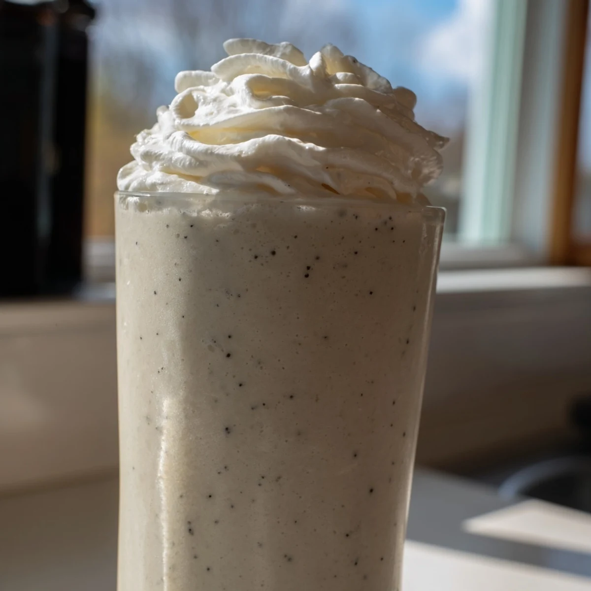 Sweet Starbucks Vanilla Bean Frappuccino served chilled with a straw and frothy texture.