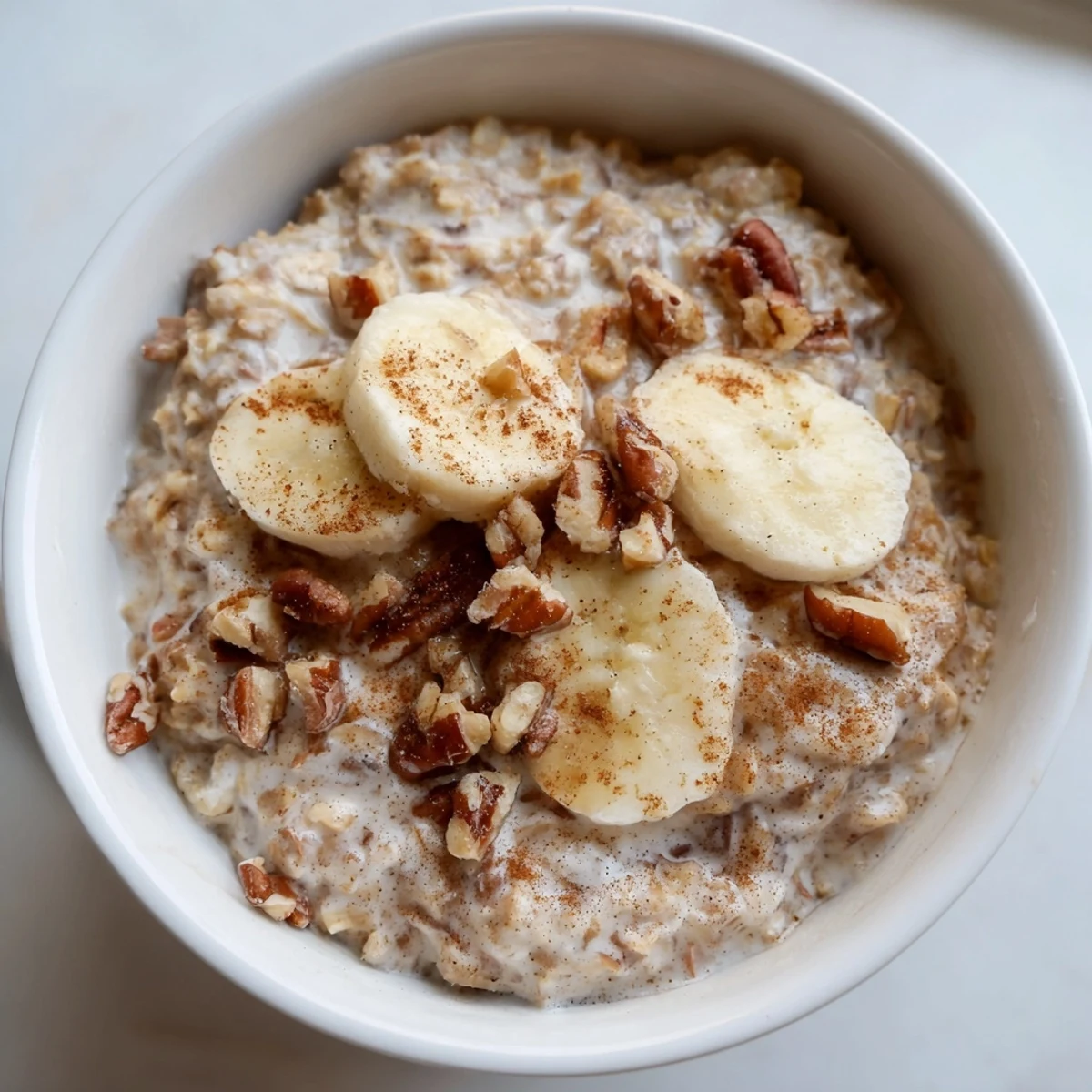 Wholesome brown sugar overnight oats layered with Greek yogurt, cinnamon swirl, and vibrant mixed berry toppings